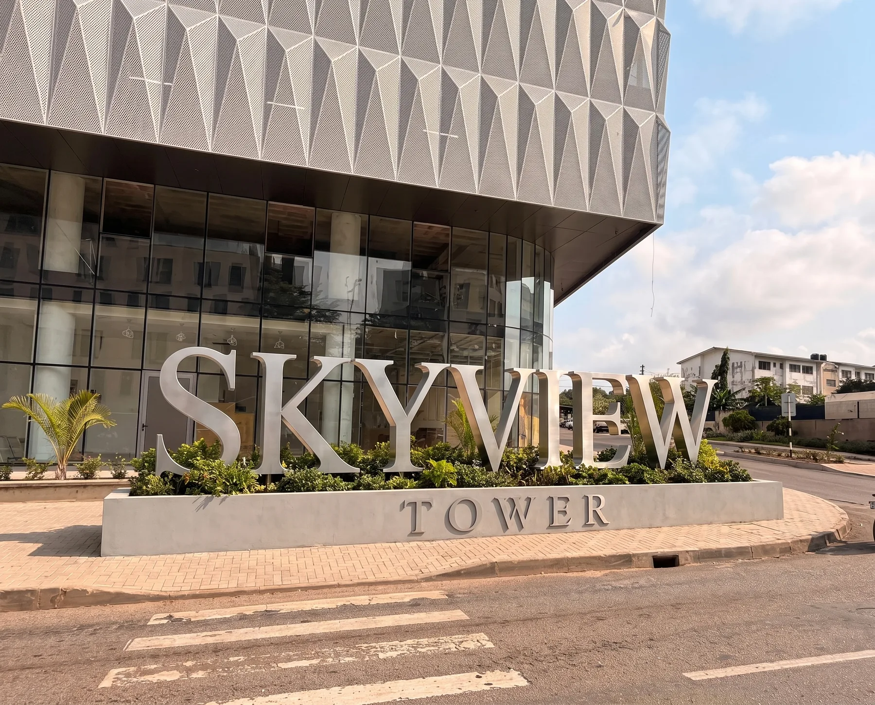 SKYVIEW letters with TOWER below on a low plinth by the road