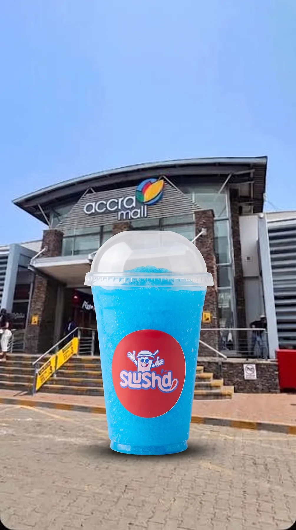 A giant Slush’d cup outside Accra Mall